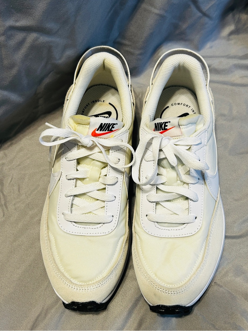 Nike White Retro Runner Sneakers with Black Outsole and Red Logo